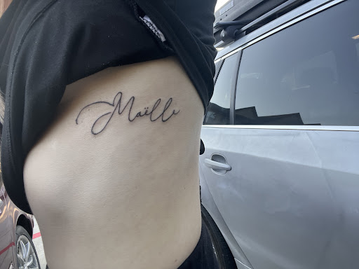 Explore t rex tattoo ideas, creative tattoo ideas in Magnolia, available at Lucky Sparrow Tattoo Shop and Piercing