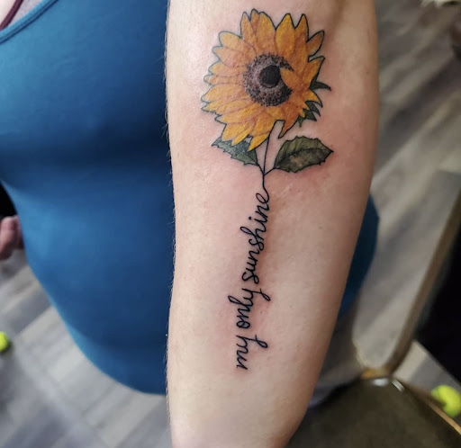 Explore back of arm tattoo ideas, creative tattoo ideas in Peoria, available at Modern Ink Tattoo