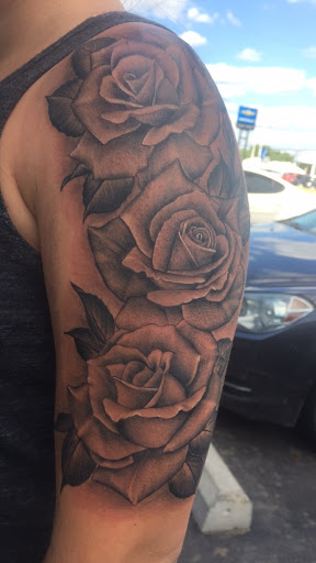 Tattoo Shop «Sterling Tattoo Company», reviews and photos, 721 N State Rd, Davison, MI 48423, USA