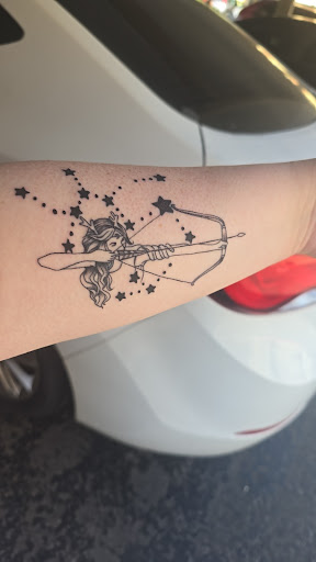 Explore daughter portrait tattoo ideas, creative tattoo ideas in Peoria, available at Iron Key Tattoo Studio Inc.