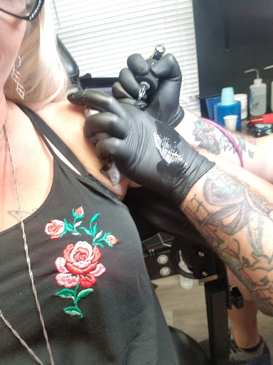 Explore forearm tattoo idea for men, creative tattoo ideas in Ocala, available at Black Lotus Tattoo & Art Gallery Inc