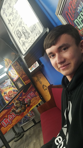 Explore never give up tattoo ideas, creative tattoo ideas in Brunswick, available at Blue Fin Tattoos