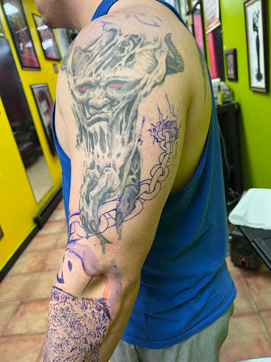 Explore february birthday tattoo ideas, creative tattoo ideas in Warsaw, available at Rock & Roll Tattoo and Piercing Co.