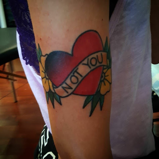 Explore feminine half sleeve tattoo ideas, creative tattoo ideas in Snohomish, available at Unknown Tattoo Co.