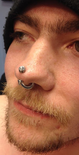 Explore inner bicep tattoo ideas for guys, creative tattoo ideas in Moorhead, available at CBA (Chucks Body Art)