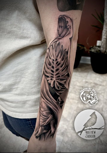 Explore leopard print tattoo ideas, creative tattoo ideas in Nashville, available at RedBird Tattoo