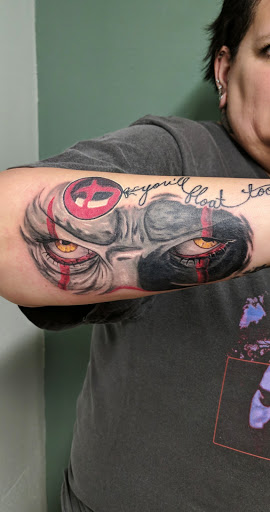 Explore minimalist tattoo ideas for men, creative tattoo ideas in Modesto, available at Painted Ape Gallery And Tattoos