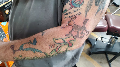 Explore tattoo ideas for gangsters, creative tattoo ideas in Sherwood, available at Diamond State Tattoo Parlor