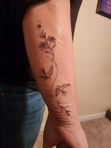 Explore heart with wings tattoo ideas, creative tattoo ideas in Oak Grove, available at Empire28 Tattoo Studios