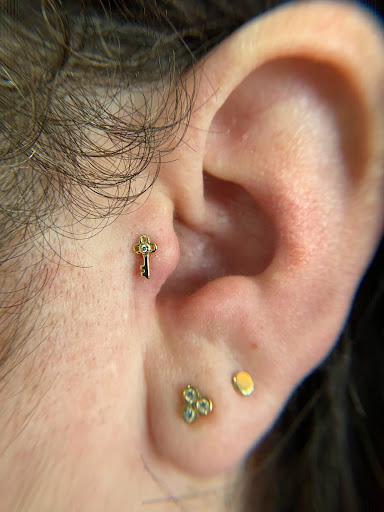 Explore wedding anniversary tattoo ideas, creative tattoo ideas in Orange, available at Symbiosis Body Piercing