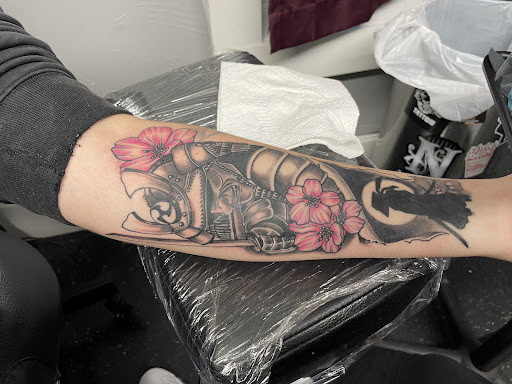 Explore bass fishing tattoo ideas, creative tattoo ideas in Worcester, available at Evil Eye Tattoo