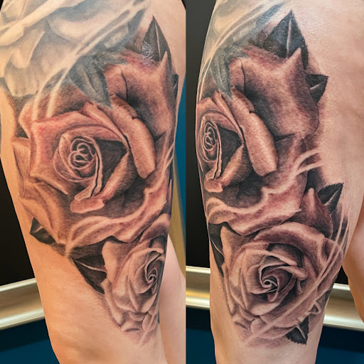 Explore dog sleeve tattoo ideas, creative tattoo ideas in Clarksville, available at Chris Wallace Tattoos