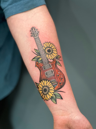 Find earth tattoo ideas for your next unique tattoo in Kingsford at Deft Tattoo Studio