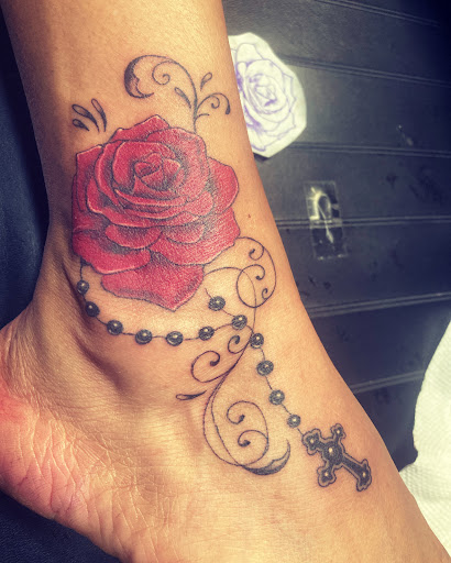 Explore front thigh tattoo ideas for women, creative tattoo ideas in Visalia, available at Sanctum Tattoo Studio