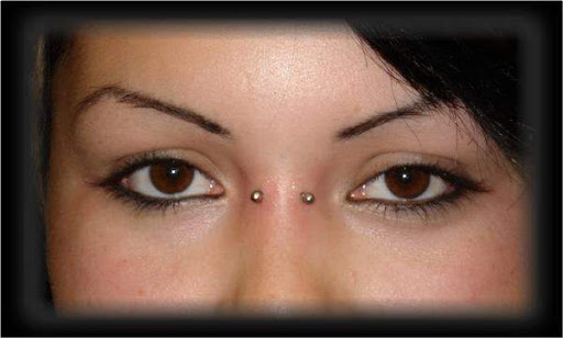 Explore gap filler tattoo background shading ideas, creative tattoo ideas in Norwalk, available at Metamorfosis Tattoo and Piercing Studio