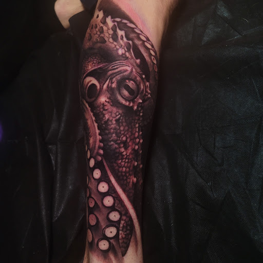 Explore tattoo ideas on ribs for guys, creative tattoo ideas in Orem, available at Hearts and Hands Tattoo and Piercing