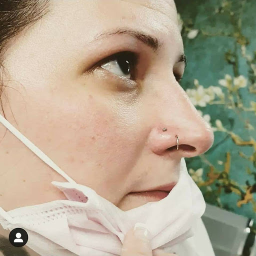 Find tattoo necklace ideas for your next unique tattoo in North Charleston at Exotic Impressions Body Piercing