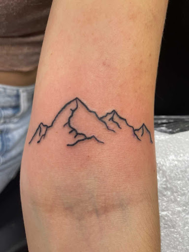 Explore cool neck tattoo ideas, creative tattoo ideas in Slippery Rock, available at Dinky Dachshund Tattoo Parlor