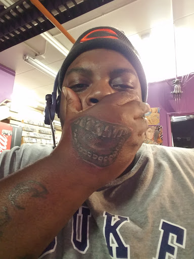 Explore hand tattoos men ideas, creative tattoo ideas in Lake Station, available at 219 Ink