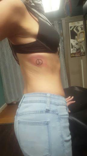 Explore unique breast cancer tattoo ideas, creative tattoo ideas in Rensselaer, available at A Vita Tattoo