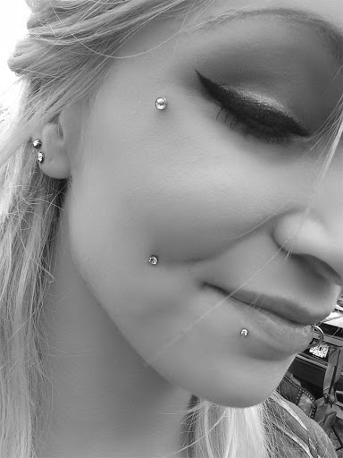 Explore spine tattoo ideas female, creative tattoo ideas in Saint Louis, available at Steel and Ink Tattoo Studio