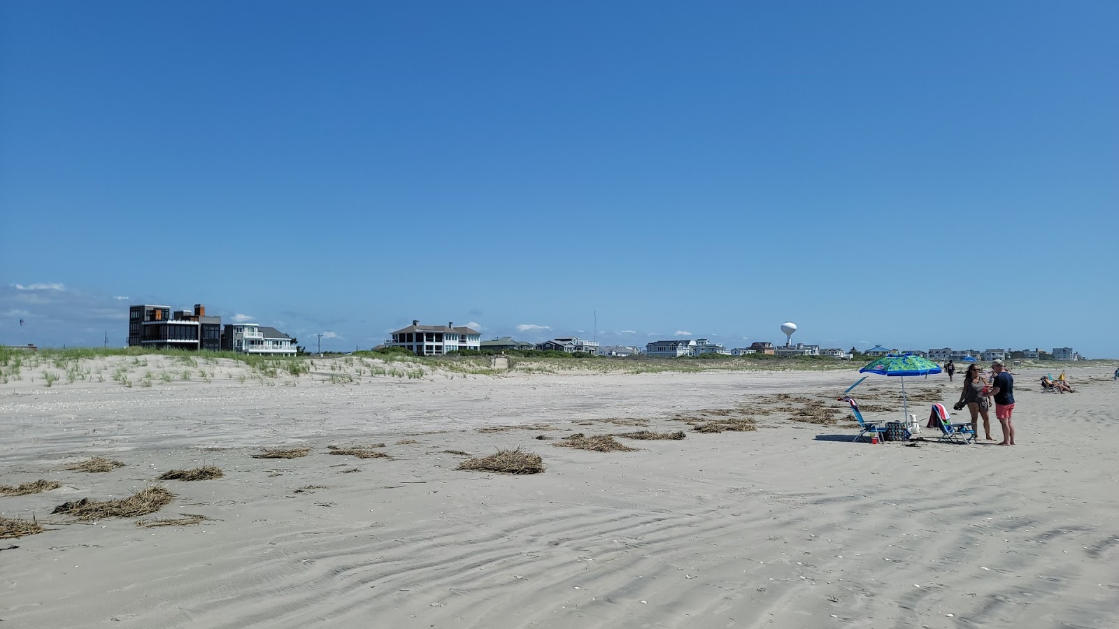 Strathmere Beach'in fotoğrafı düz bir kıyı şeridi ile birlikte