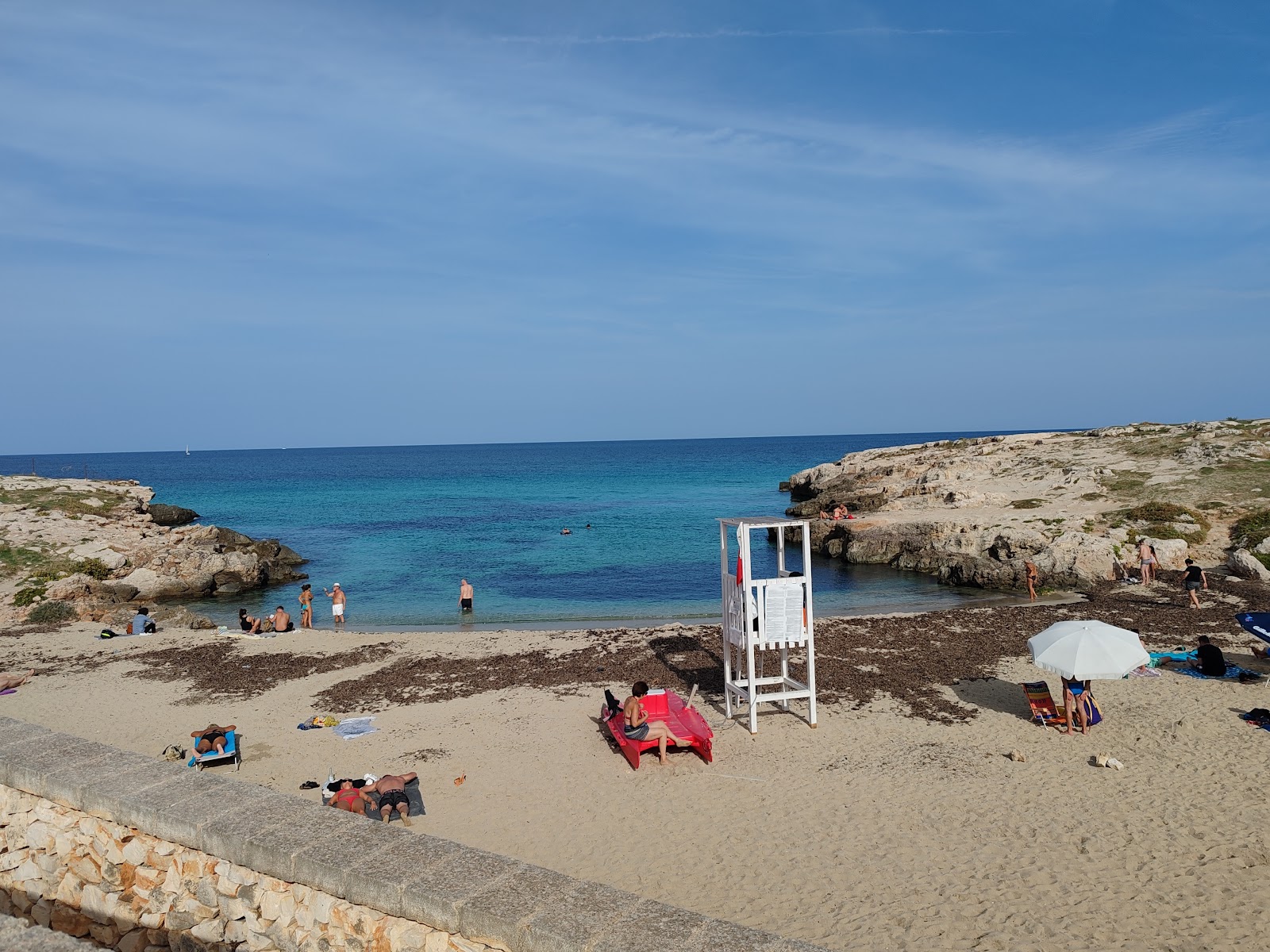 Fotografija Spiaggia di Cala Porto Rosso z visok stopnjo čistoče