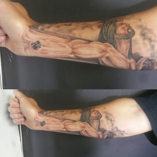 Tattoo Shop «Liquid Tattoo», reviews and photos, 16583 Old U.S. 27, Lansing, MI 48906, USA