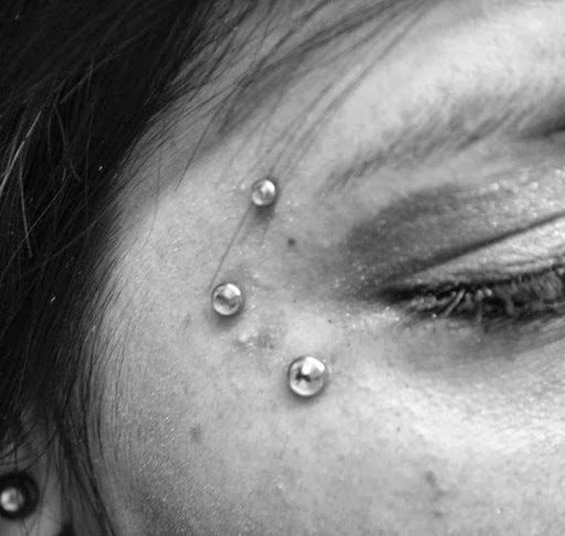 Explore side finger tattoo ideas, creative tattoo ideas in Ventura, available at Ventura Tattoo & Piercing