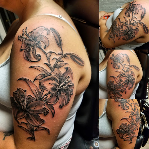 Explore ideas for arm tattoos, creative tattoo ideas in Cumberland, available at Queen City Ink