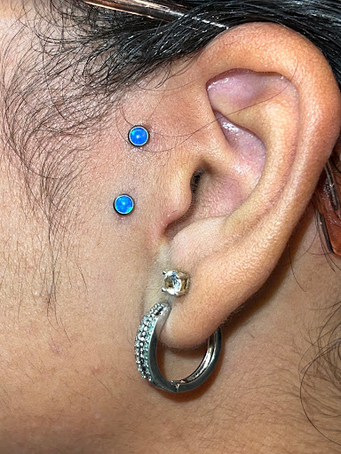 Explore cosmos flower tattoo ideas, creative tattoo ideas in Bradenton, available at Body Effects Tattoo & Piercing