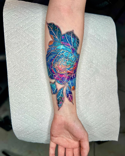 Explore memorial tattoo ideas for men, creative tattoo ideas in Wisconsin Dells, available at Alpha Red Tattoo & Barber Studio