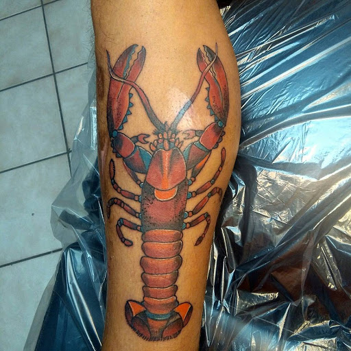 Explore inner bicep tattoo ideas for guys, creative tattoo ideas in Bradenton, available at Memory Lane Tattoo Co.