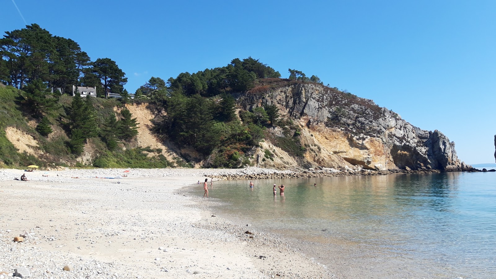 Foto van Plage du Porzic met turquoise puur water oppervlakte