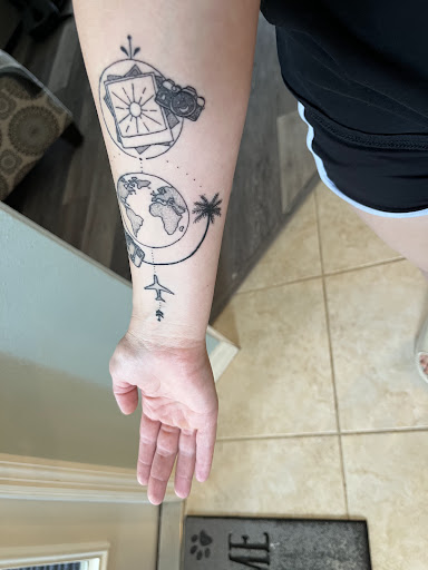 Explore ski tattoo ideas, creative tattoo ideas in Lakeland, available at Lyons Den Tattoo Company