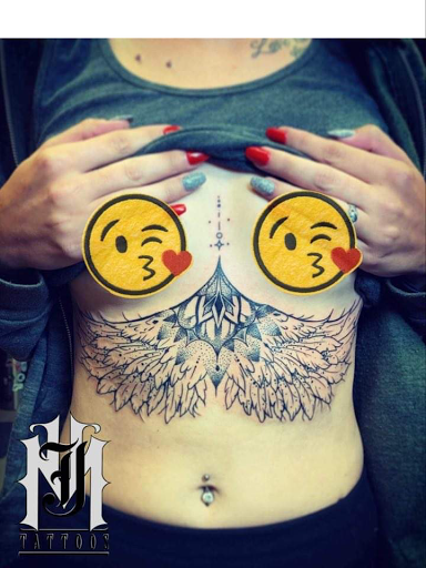 Explore butterfly and rose tattoo ideas, creative tattoo ideas in Williamsport, available at Moa Tattoos