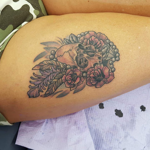 Explore optical illusion tattoo ideas, creative tattoo ideas in Owensboro, available at Lady Luck Tattoo and Body Piercing