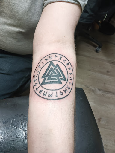 Explore men neck tattoo ideas, creative tattoo ideas in Geneseo, available at Max Ink Tattoos & Piercing