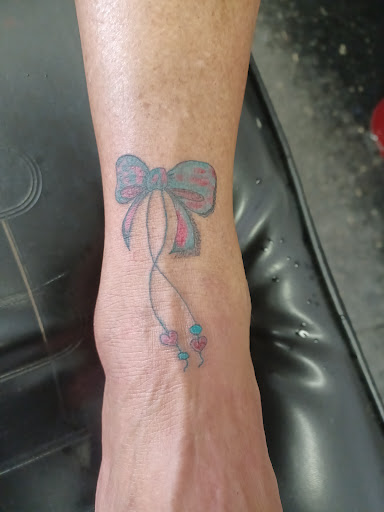 Explore armband tattoo ideas for men, creative tattoo ideas in Owosso, available at Twisted ink tattoo