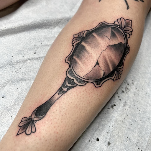 Explore tattoo cover up ideas on neck, creative tattoo ideas in Buffalo, available at True Gloom Tattoo Studio