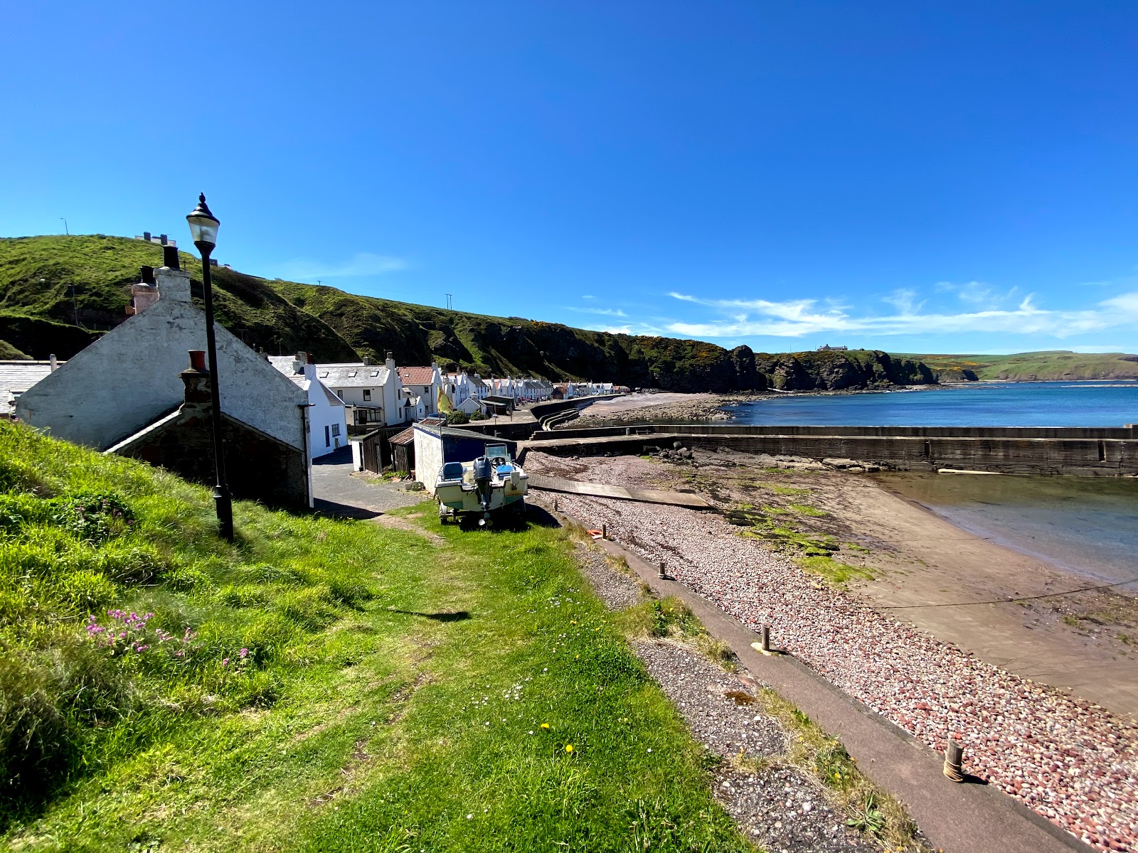 Photo of Pennan Bay Beach with straight shore