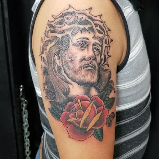 Find tattoo ideas of trees for your next unique tattoo in Ozark at Tooth & Nail Tattoo & Piercing