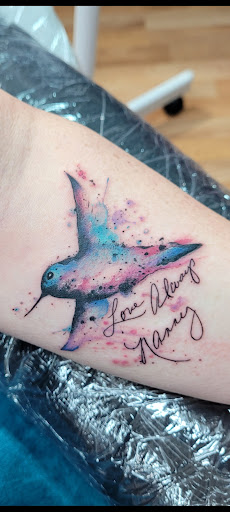 Explore ladies small tattoo ideas, creative tattoo ideas in Benton, available at Spectrum Tattoo