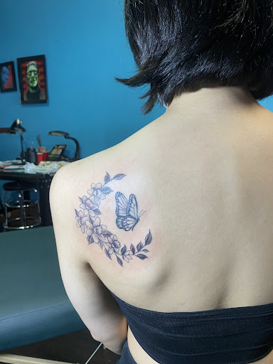 Find tattoo between breast ideas for your next unique tattoo in San Jose at Legacy Tattoo