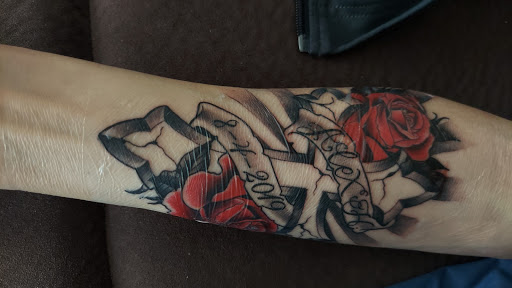 Explore black and red tattoo ideas, creative tattoo ideas in Ogden, available at Legacy Tattoo