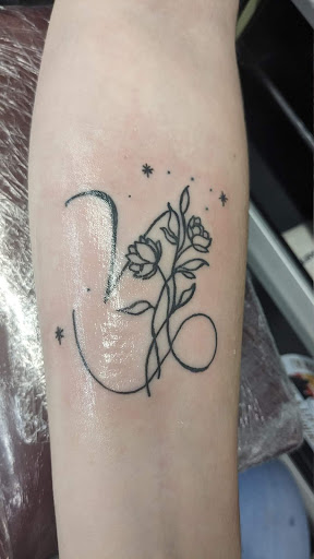 Explore female family tattoo ideas, creative tattoo ideas in Saint Albans, available at Red Dragon Tattoo