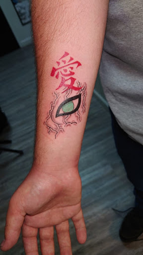 Explore tiny hummingbird tattoo ideas, creative tattoo ideas in Jonesboro, available at Immortal Ink