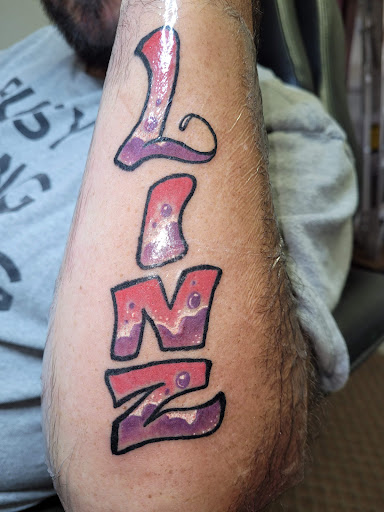 Explore tribal tattoo ideas for women, creative tattoo ideas in Angola, available at Hoodlum Ink