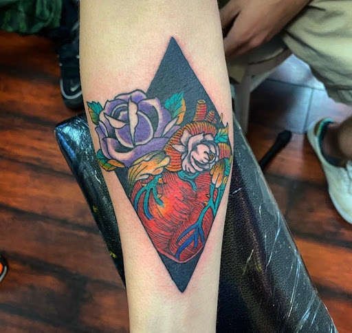 Explore tattoo ideas for music lovers, creative tattoo ideas in Baltimore, available at Rippd Canvas Tattoo Shop Artists Social Club