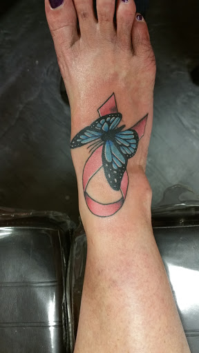 Explore alien tattoo ideas, creative tattoo ideas in Foley, available at Black Sheep Custom Tattoos and Piercings